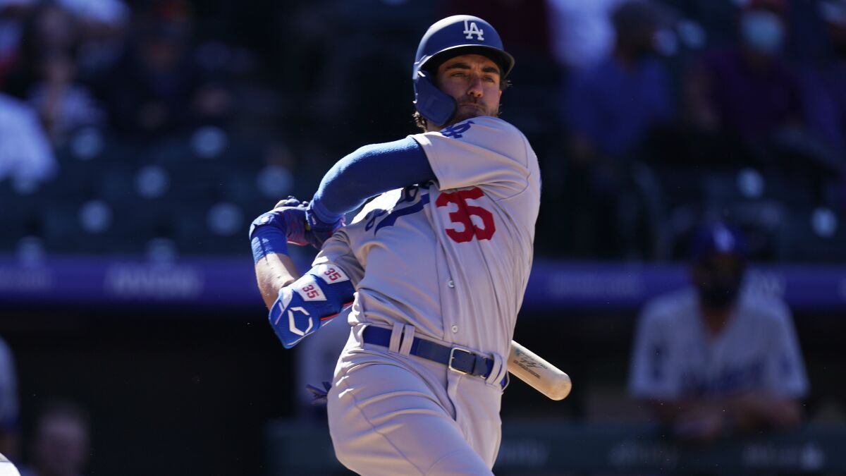 Dodgers center fielder Cody Bellinger swings during an at-bat against the Colorado Rockies on April 1.