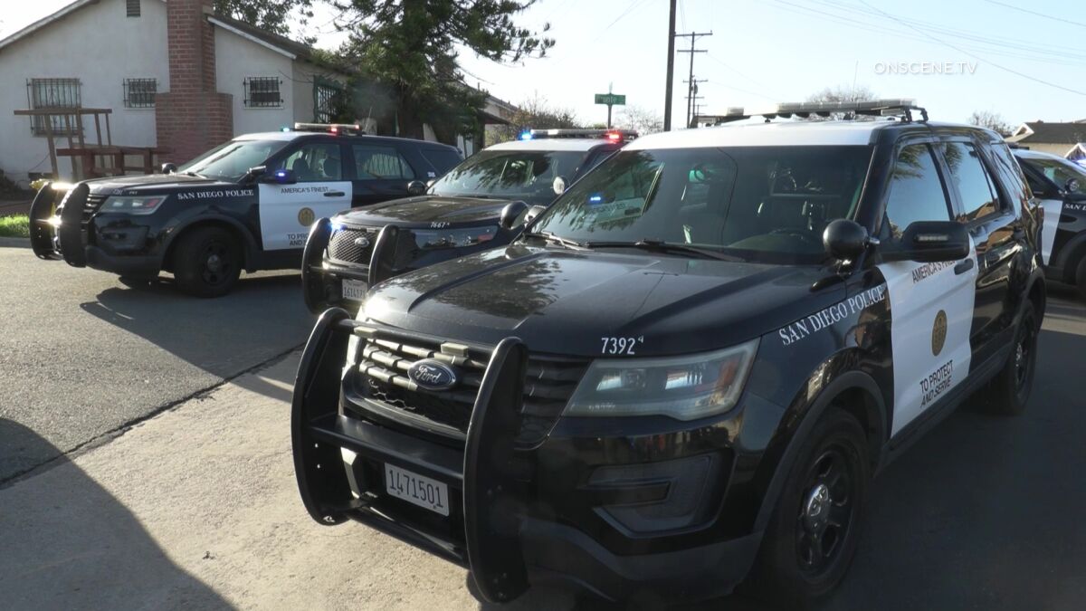 San Diego police cars park at a crime scene