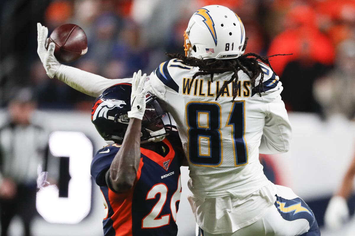 Chargers receiver Mike Williams made some incredible catches against the Broncos, including this one next to cornerback Isaac Yiadom.
