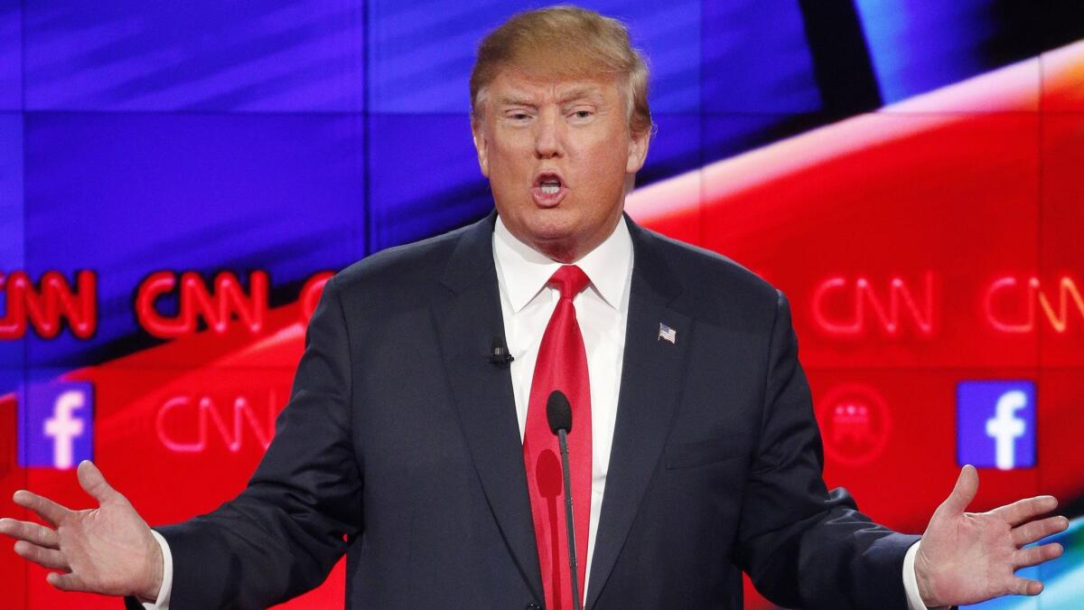 Donald Trump makes a point during the CNN Republican presidential debate in Las Vegas on Dec. 15, 2015.