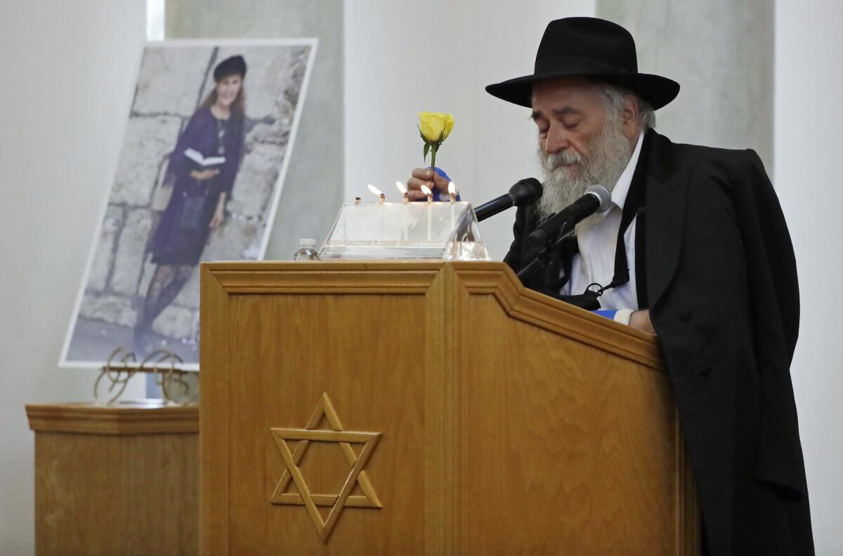 Rabbi Yisroel Goldstein  speaks at the funeral for Lori Gilbert-Kaye, killed in the attack on Chabad of Poway last year.