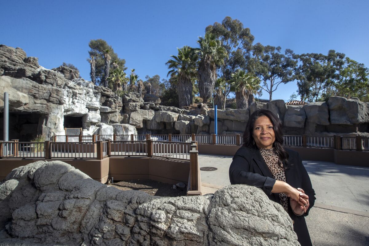 Los Angeles Zoo Director Denise Verret stands in front of the old pelican exhibit at the zoo. 