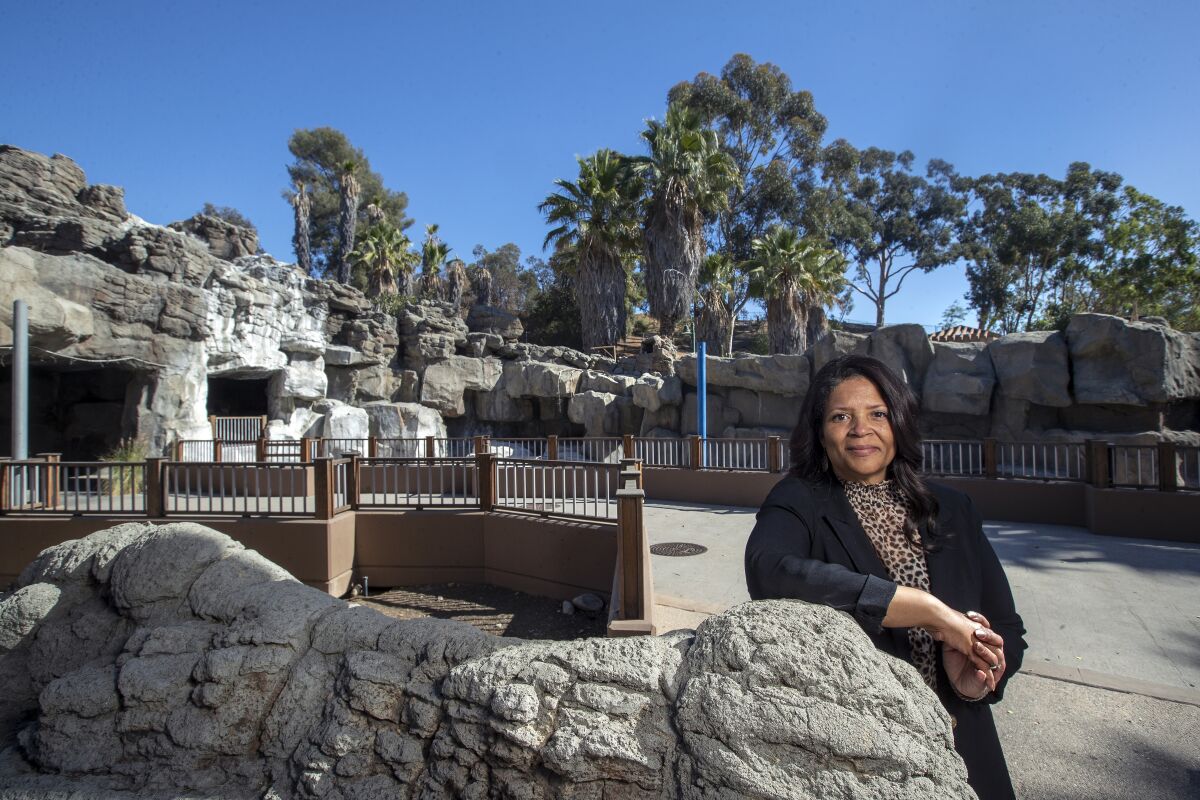 Los Angeles Zoo Director Denise Verret stands in front of the old pelican exhibit at the zoo.