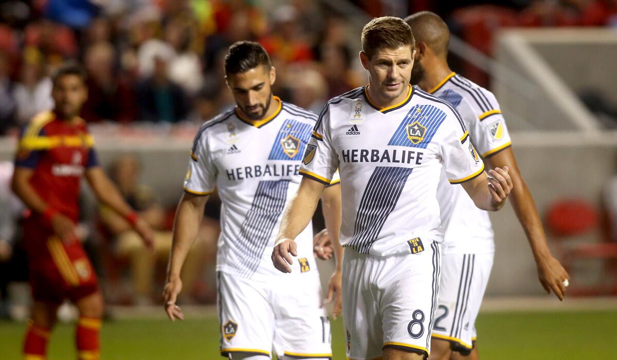 L.A. Galaxy’s Steven Gerrard (8) talks to a teammate during the first half of a match on Saturday.