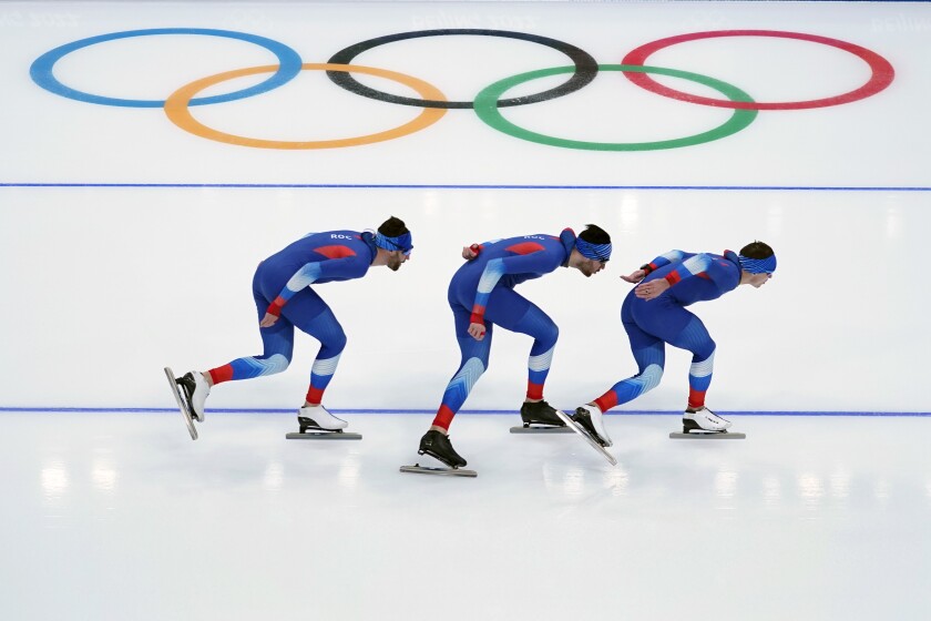 Speedskaters representing Russian Olympic Committee work out during a practice session at the 2022 Winter Olympics, Tuesday, Feb. 1, 2022, in Beijing. (AP Photo/Jeff Roberson)