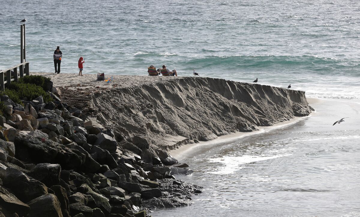 The Laguna Bluebelt Coalition is seeking enforcement to protect the Aliso Beach berm.