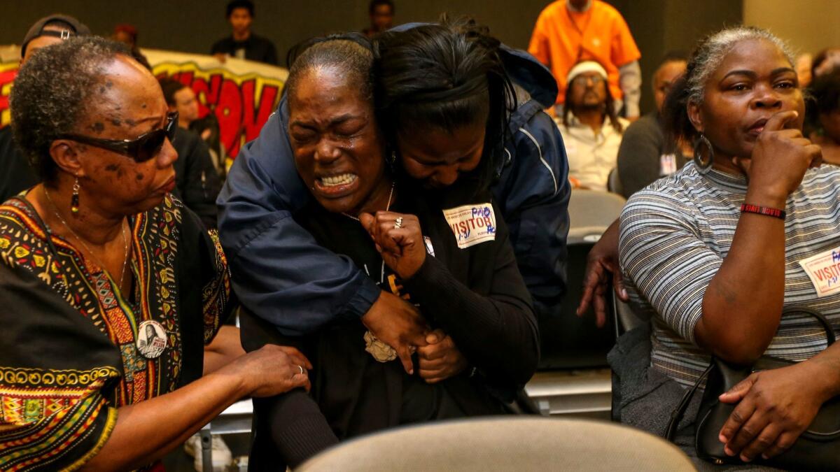 Lisa Hines, the mother of Wakiesha Wilson, is comforted earlier this year after the Police Commission determined that no LAPD officers were "substantially involved" in her daughter's death.