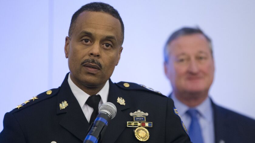 Philadelphia Police Commissioner Richard Ross, in file photograph with Mayor Jim Kenney, defended police officers who arrested two black men at a Starbucks, saying police were responding to a complaint from the business.