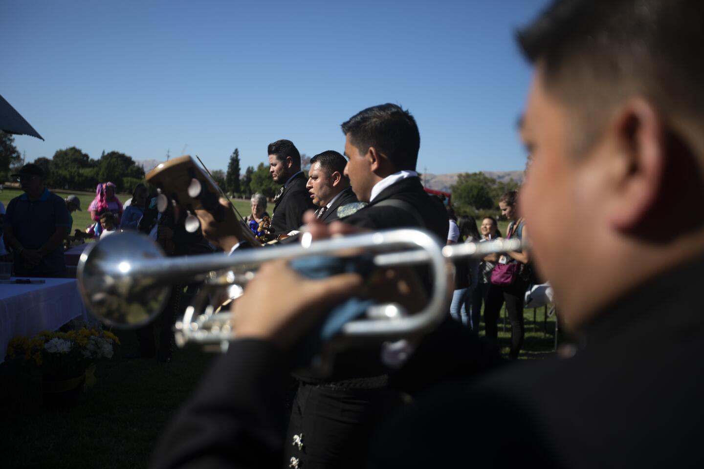 A mariachi band plays music as family and friends honor Keyla in San Jose.