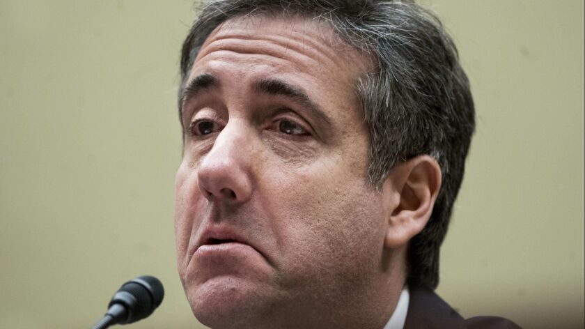 Michael Cohen, former aide and lawyer to President Donald Trump, testifies before the House Oversight and Reform Committee on Capitol Hill on Feb. 27.