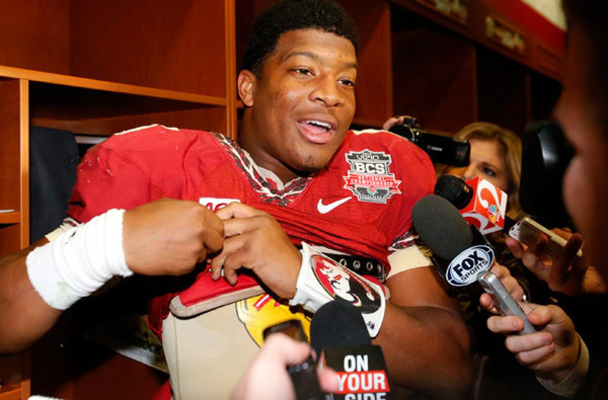 Florida State quarterback Jameis Winston talks to reporters after winning the BCS national title game last month in Pasadena.