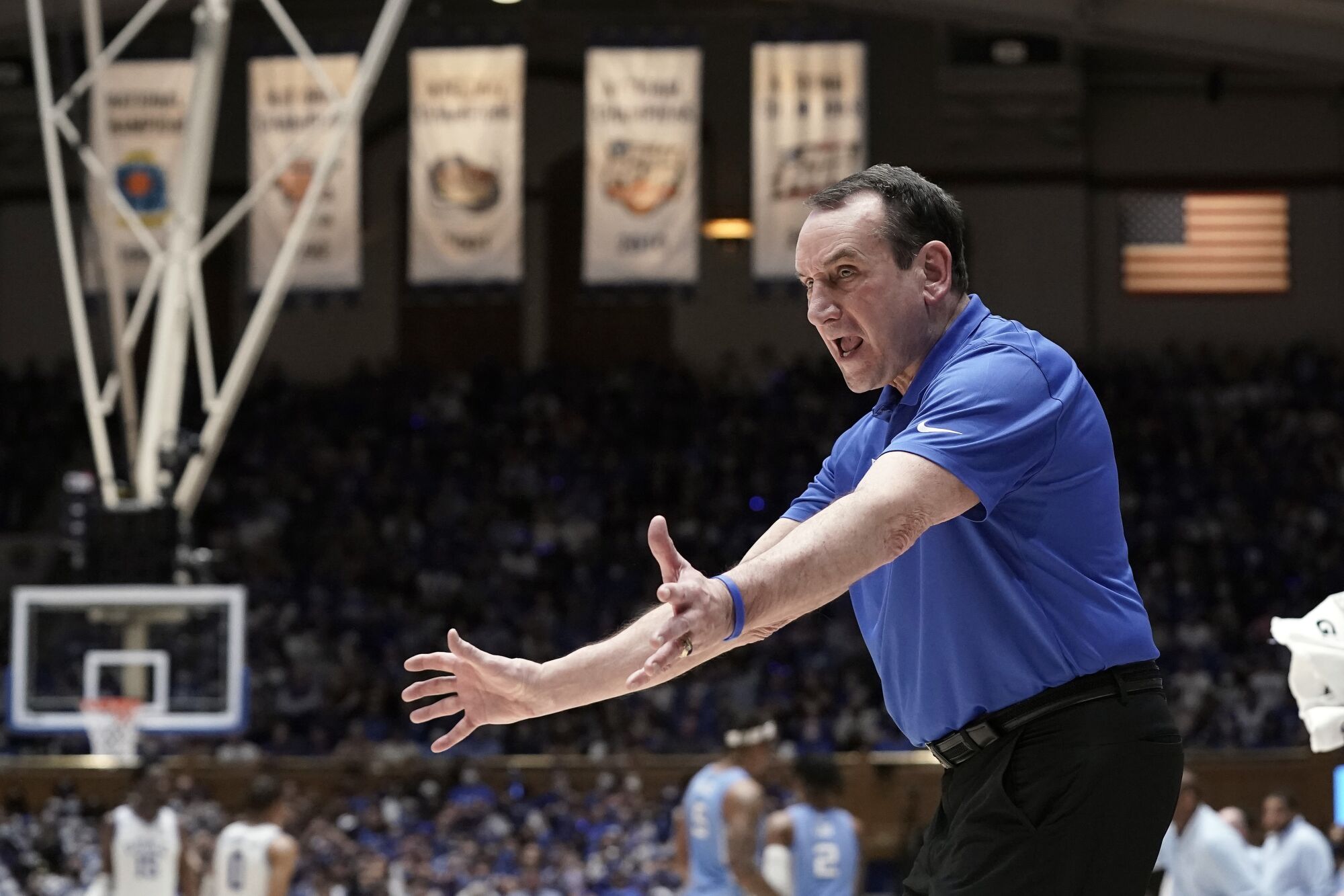 Duke coach Mike Krzyzewski instructs his players during the second half of the Blue Devils' 94-81 loss to North Carolina.