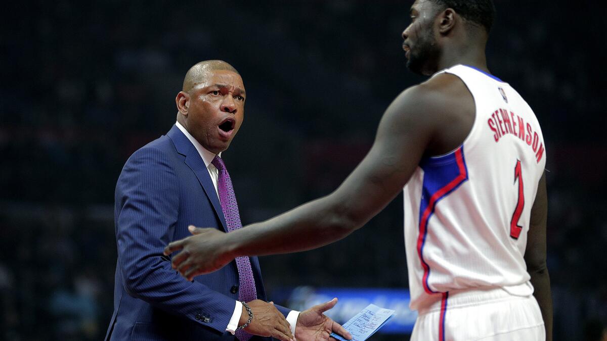 Clippers Coach Doc Rivers has a few words for Lance Stephenson during a game against the Grizzlies on Nov. 9.