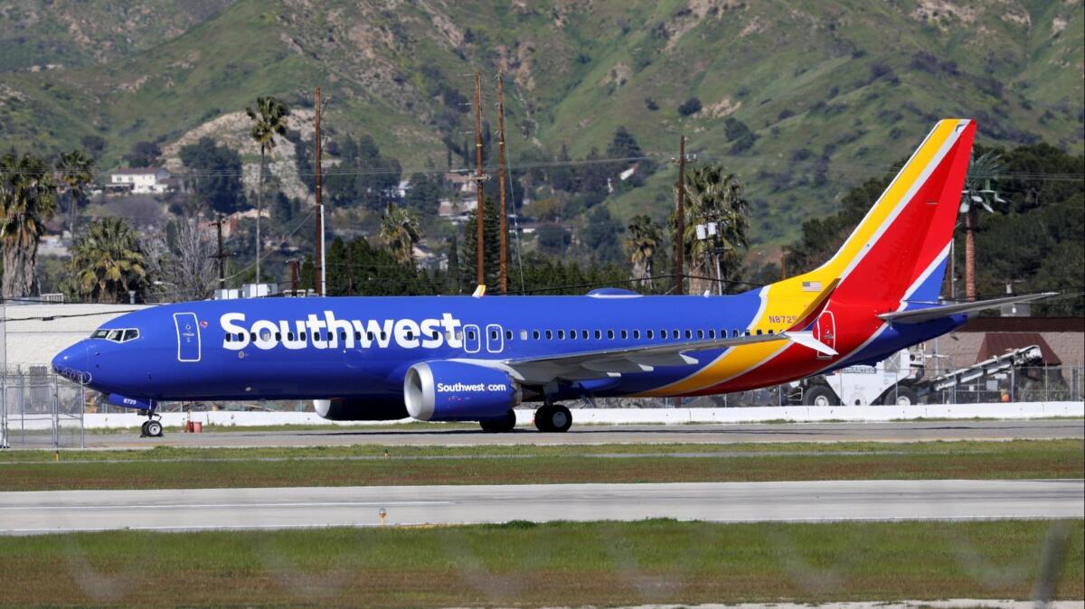 A Southwest Airlines Boeing 737 Max 8 plane is grounded at Hollywood Burbank Airport.