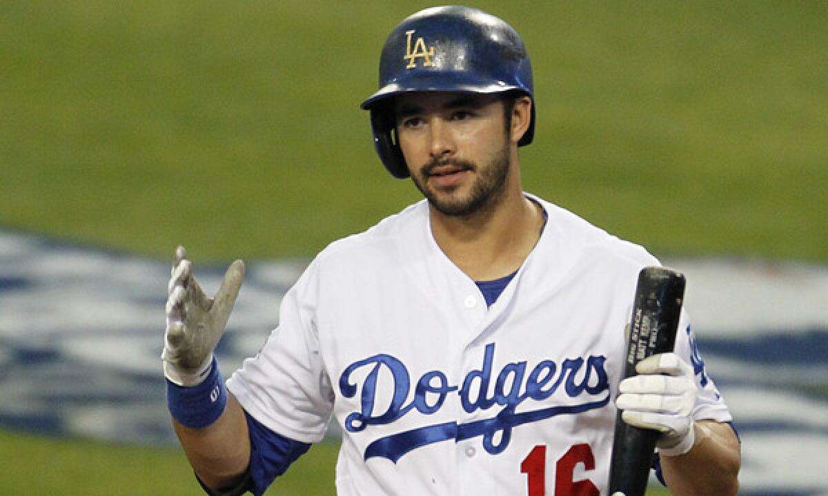 Dodgers outfielder Andre Ethier reacts after striking out in Game 4 of the National League Championship Series against the St. Louis Cardinals on Oct. 15. A foul ball hit by Either in spring training Friday hit Dodgers legend Sandy Koufax in the head.