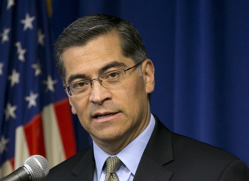 FILE - In this Jan. 24, 2018 file photo California Attorney General Xavier Becerra talks during a news conference.