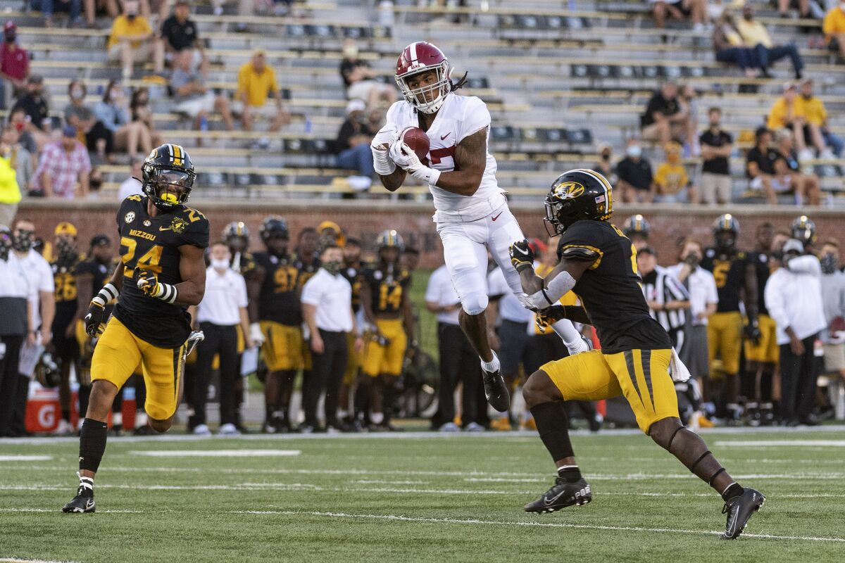 Alabama wide receiver Jaylen Waddle makes a catch against Missouri on Sept. 26, 2020.