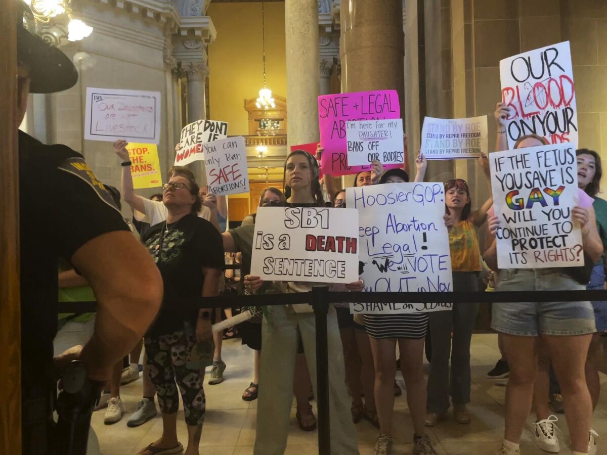 Abortion rights protesters fill Indiana Statehouse corridors.