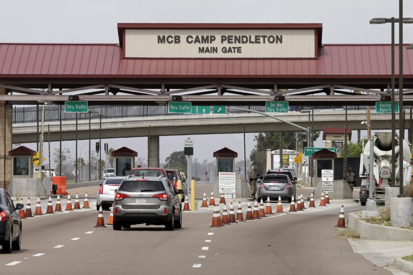 The entrance to Marine Corps base Camp Pendleton is seen Tuesday, Sept. 22, 2015, in Oceanside, Calif. (AP Photo/Gregory Bull)