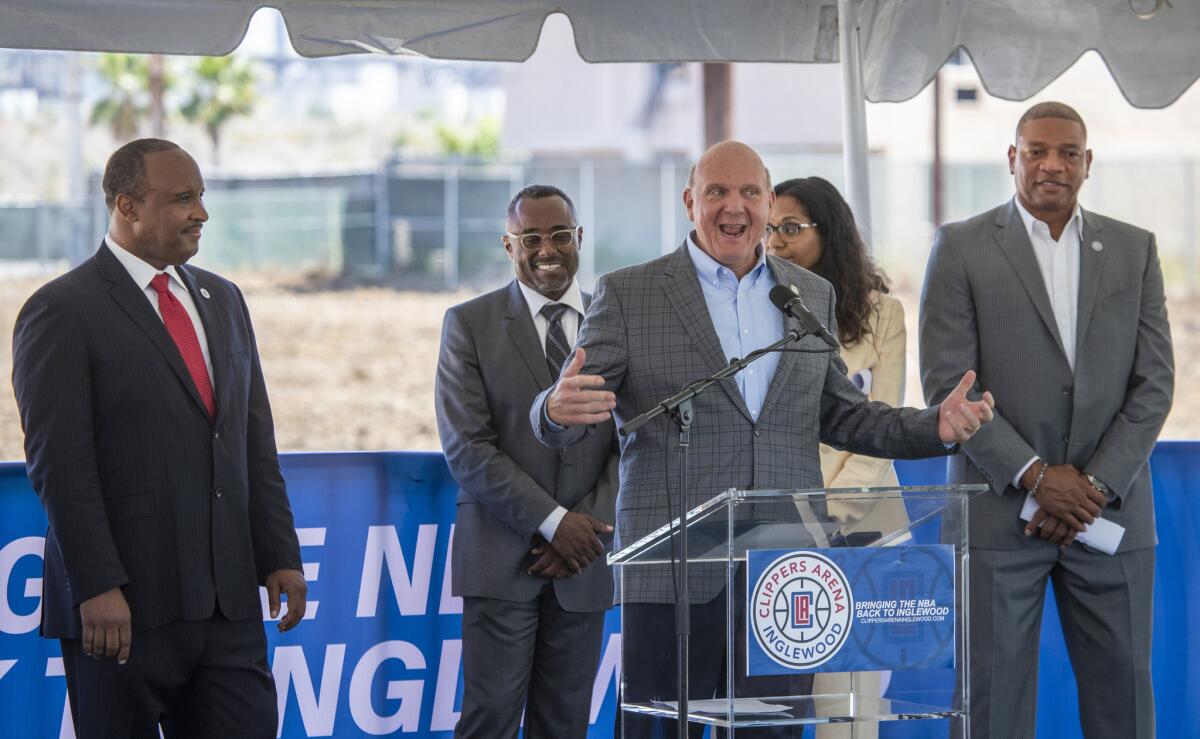 Clippers owner Steve Ballmer discusses arena plans in Inglewood during a news conference Tuesday as he flanked (from left to right) by Inglewood Mayor James Butts, Wilson Meany project manager Gerard McCallum, Assemblywoman Sydney Kamlager-Dove and coach Doc Rivers.