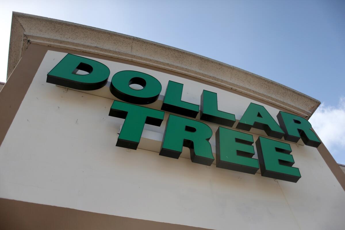 Dollar Tree Inc. has agreed to buy rival Family Dollar Stores Inc., creating a company with $18 billion in annual sales and more than 13,000 stores. Above, a Dollar Tree store in Miami.