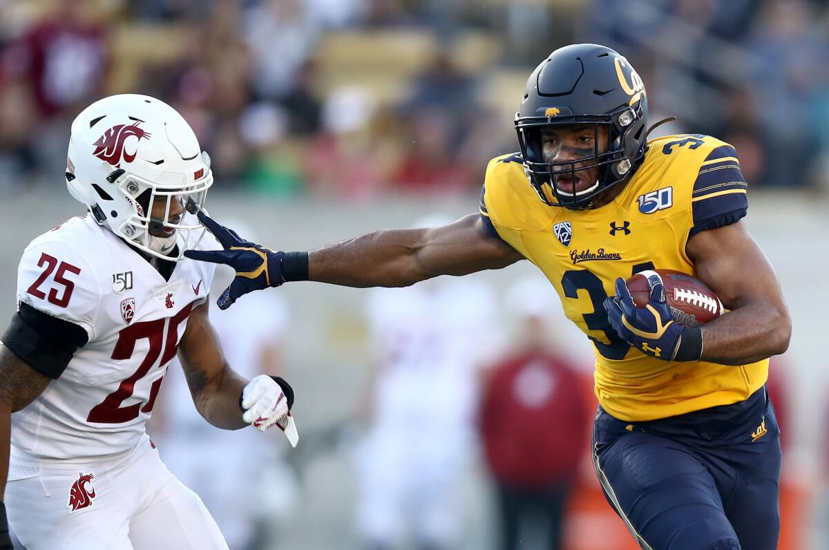 California's Christopher Brown Jr. gets away from Washington State's Skyler Thomas for a touchdown last week.