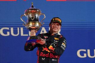 Red Bull driver Max Verstappen of the Netherlands celebrates after he won the Formula One Bahrain Grand Prix at Sakhir circuit, Sunday, March 5, 2023. (AP Photo/Frank Augstein)