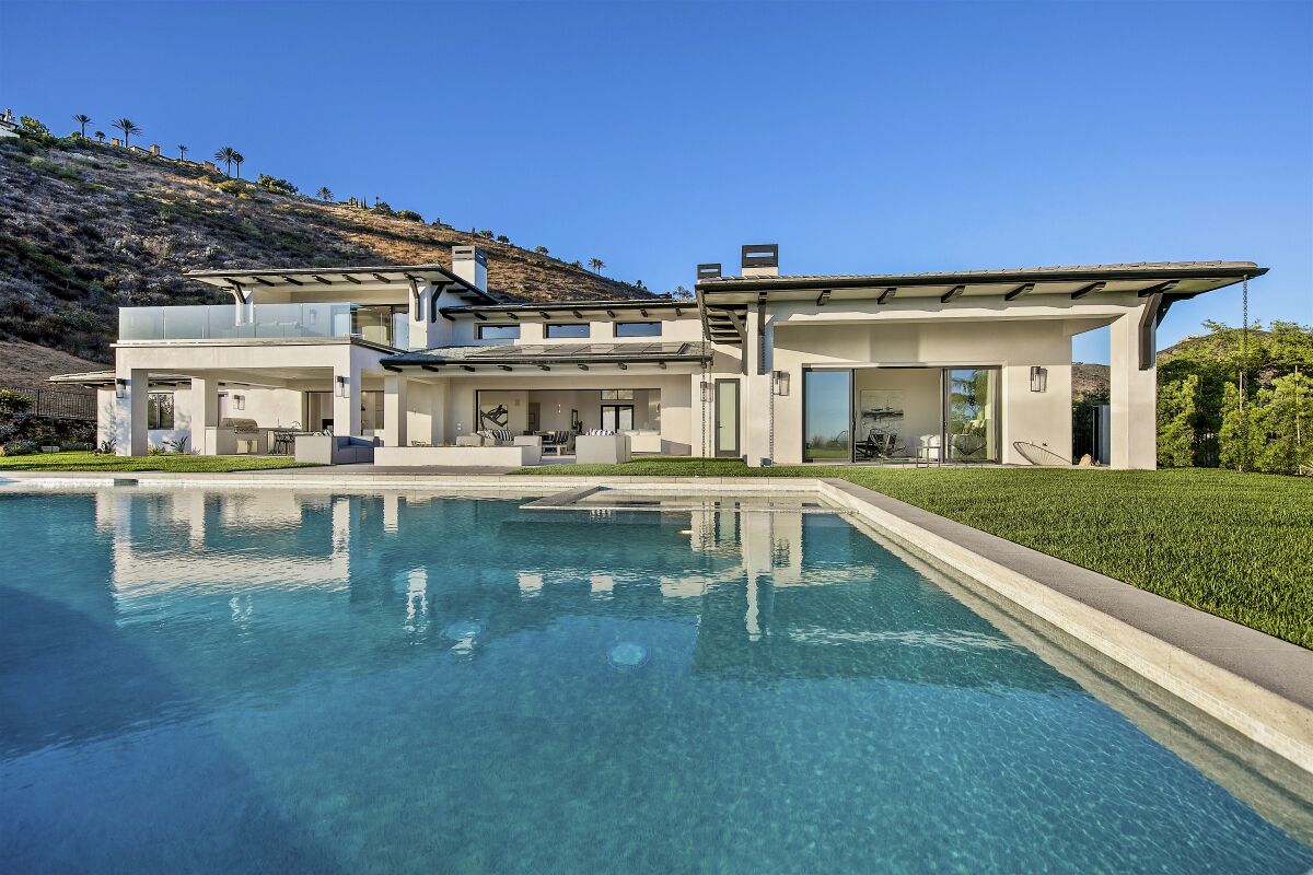 Subject to a minimum number of ticket sales, the grand prize winner in this year’s Giving Back Raffle has the choice of up to $2.1 million or a multimillion-dollar Rancho Santa Fe estate (above).