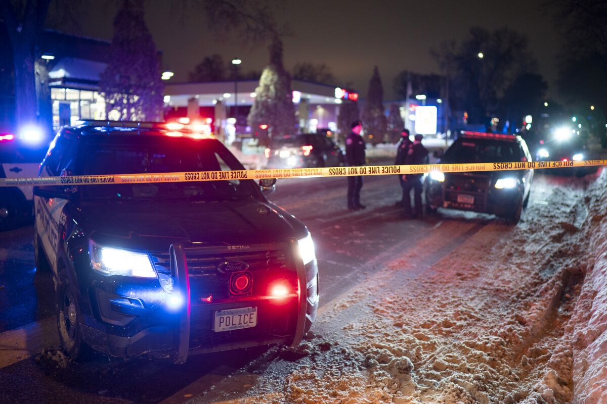 Officers at the scene of a police shooting in Minneapolis 