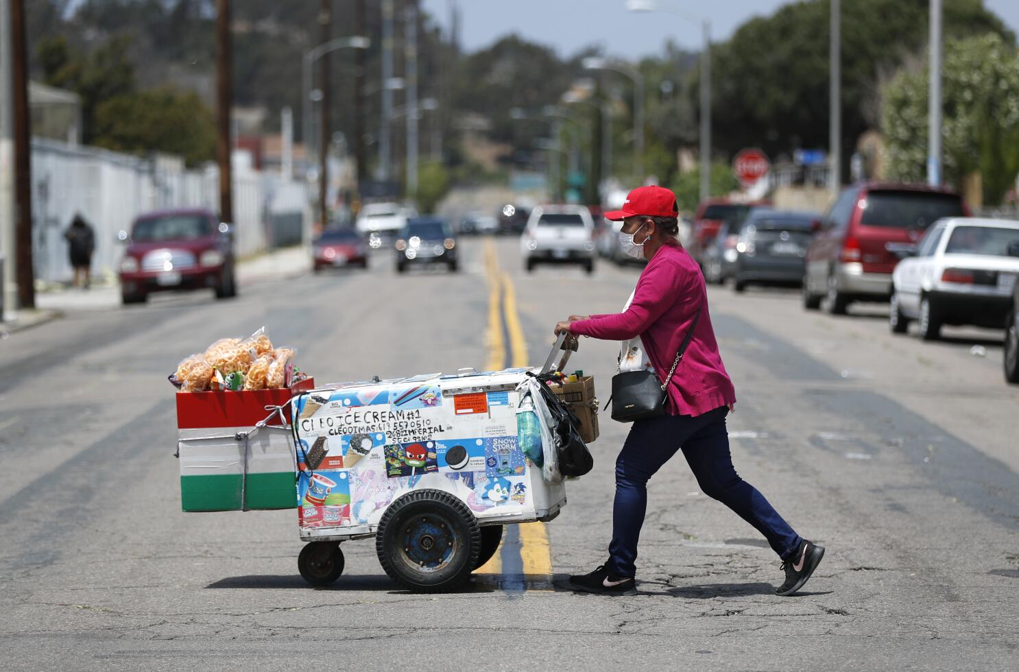 No me queda de otra': San Diego vendor pushes ice cream cart to keep family  afloat - The San Diego Union-Tribune