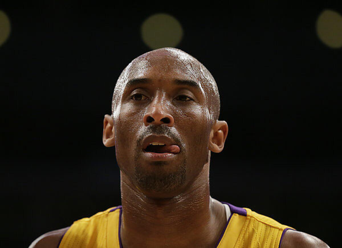 Lakers guard Kobe Bryant before he was injured in a game last season against the Golden State Warriors at Staples Center.