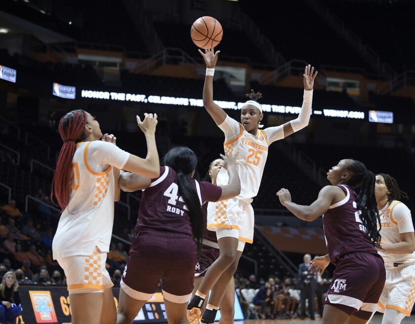 Tennessee's Jordan Horston (25) passes the ball to Tamari Key, left, during an NCAA college basketball game against Texas A&M on Thursday, Jan. 6, 2022, in Knoxville, Tenn. (Scott Keller/The Daily Times via AP)