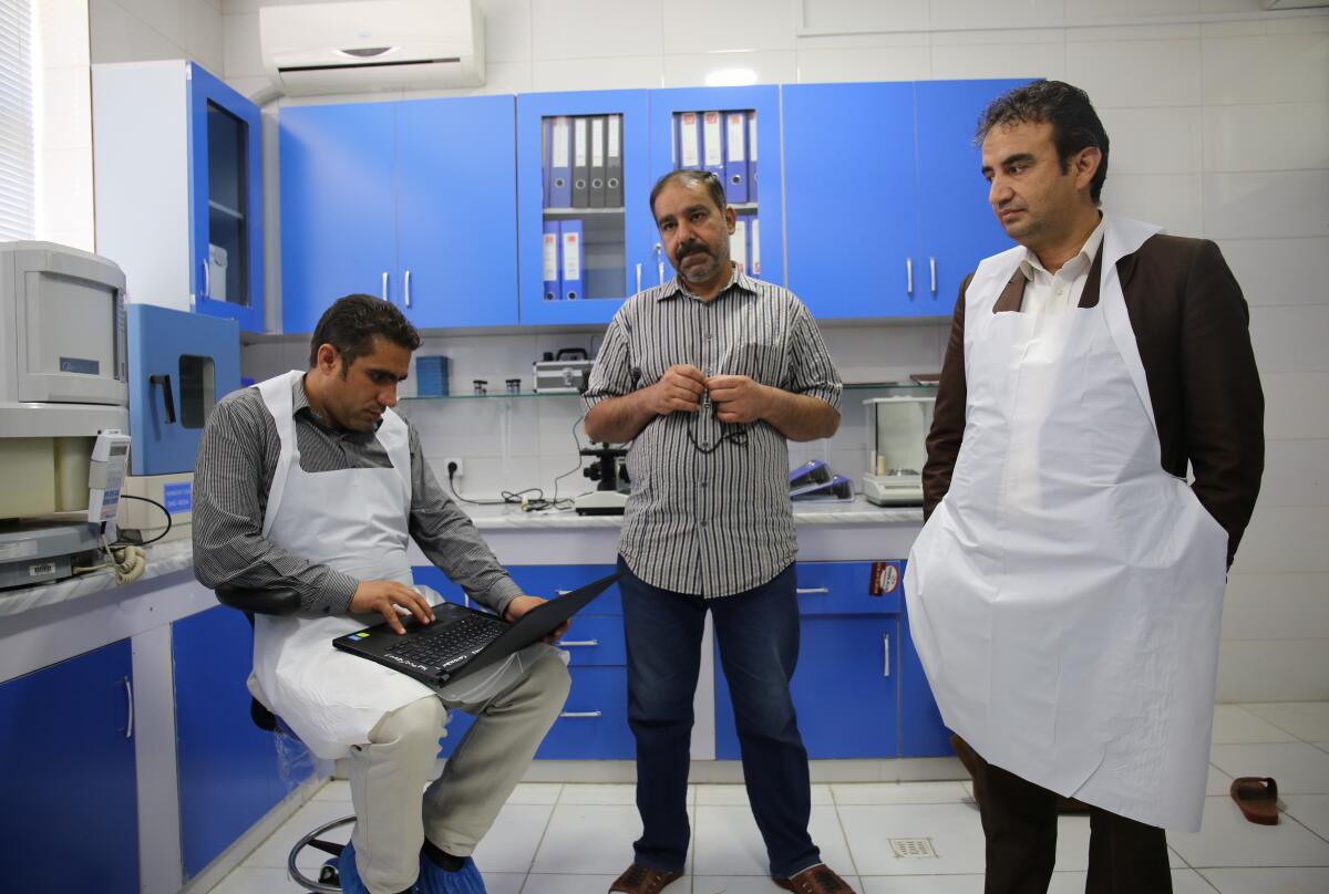 Scientists at the Forensic Medicine Directorate, Afghanistan’s only functioning forensic laboratory. 

