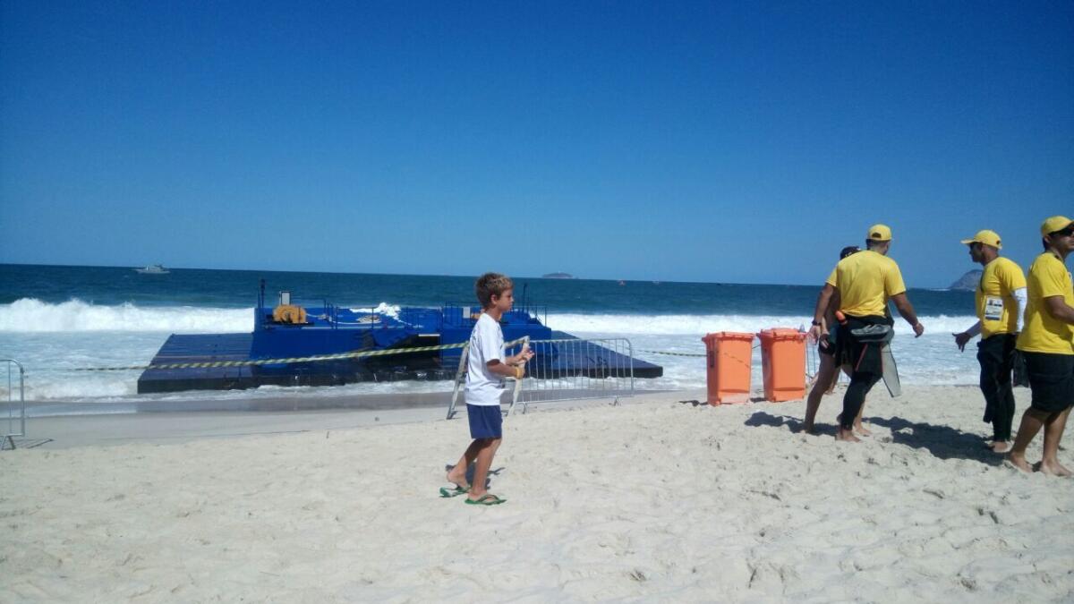 A starting platform for an open water swimming event washed up on the Copacabana Beach on Aug. 13.