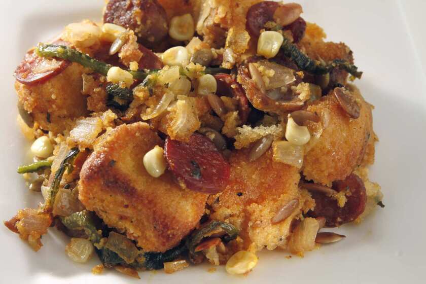 Thanksgiving stuffing with chorizo sausage, corn and pumpkin seeds.