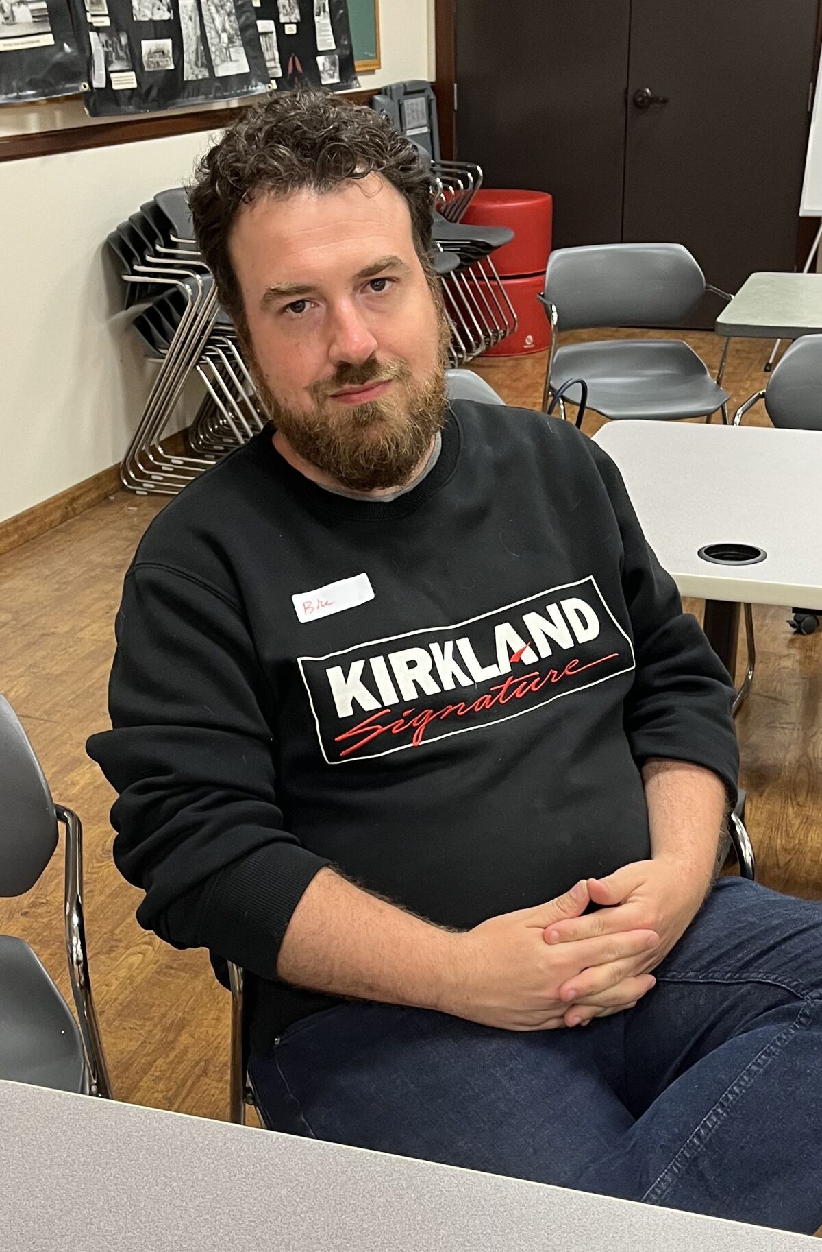Bill Przylucki, 38, pictured in a Highland Park library after watching a candidate forum.