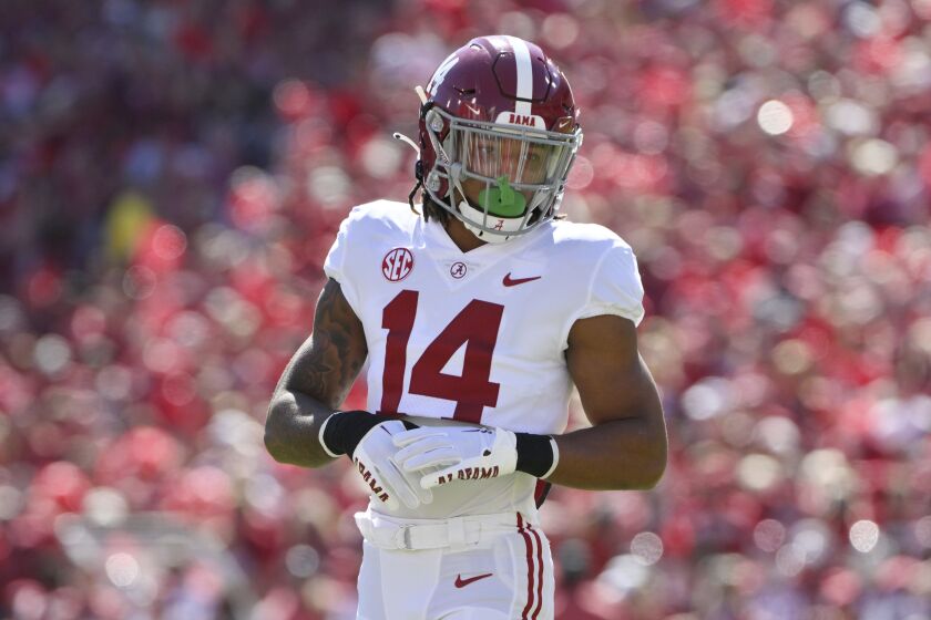 Alabama defensive back Brian Branch (14) runs a play against Arkansas during an NCAA college football game Saturday, Oct. 1, 2022, in Fayetteville, Ark. (AP Photo/Michael Woods)