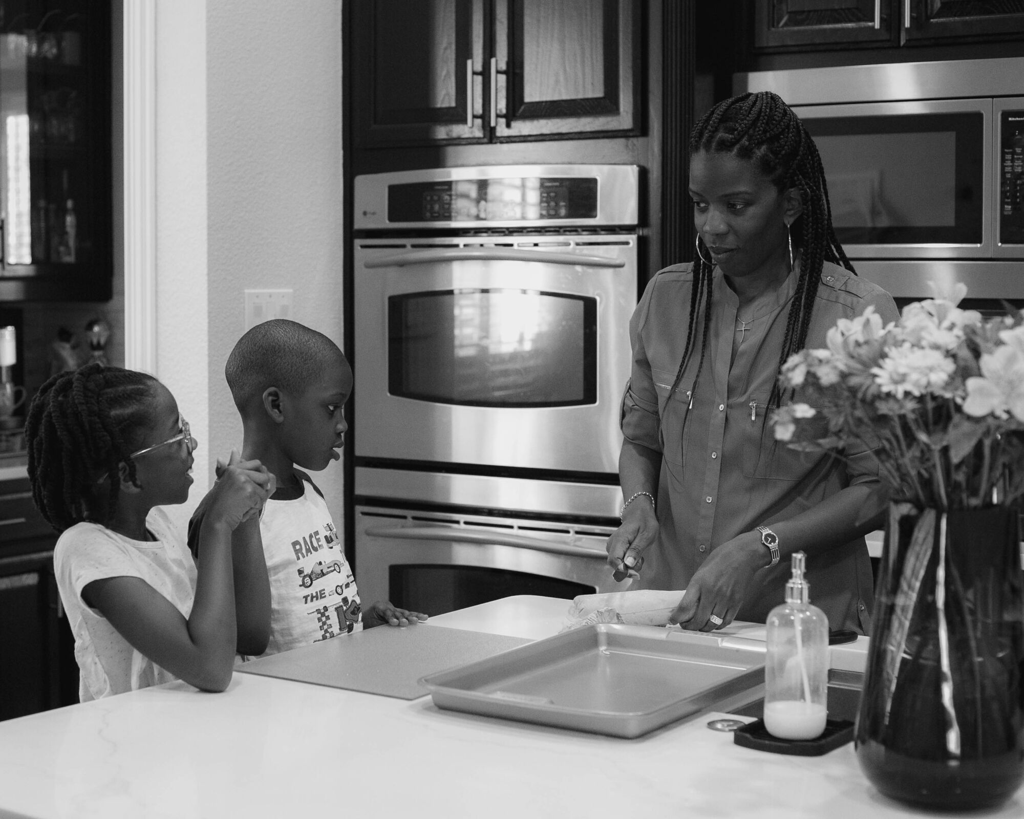 The Drummond-Clay children help their mom, Arica, bake on a Sunday afternoon.