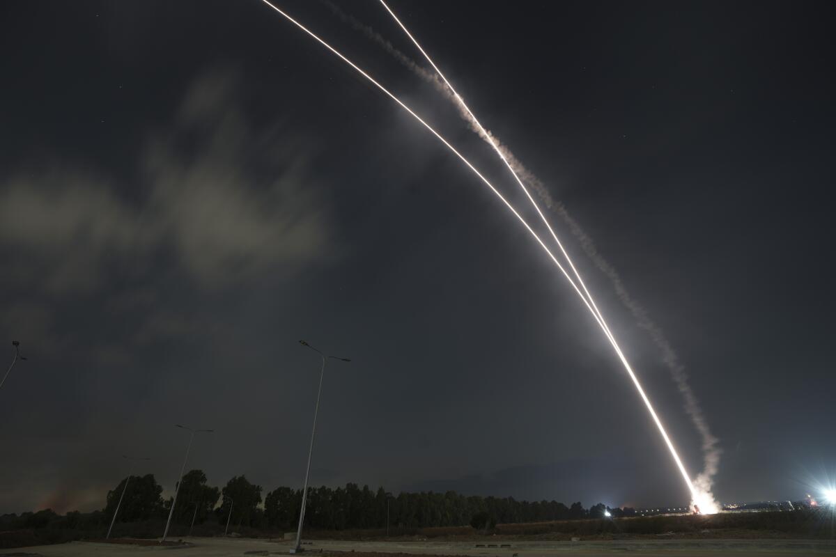 Israel's Iron Dome anti-missile system fires to intercept a rocket launched from the Gaza Strip towards Israel, near the Israeli Gaza border, Israel, Saturday, Aug. 6, 2022. (AP Photo/Ariel Schalit)