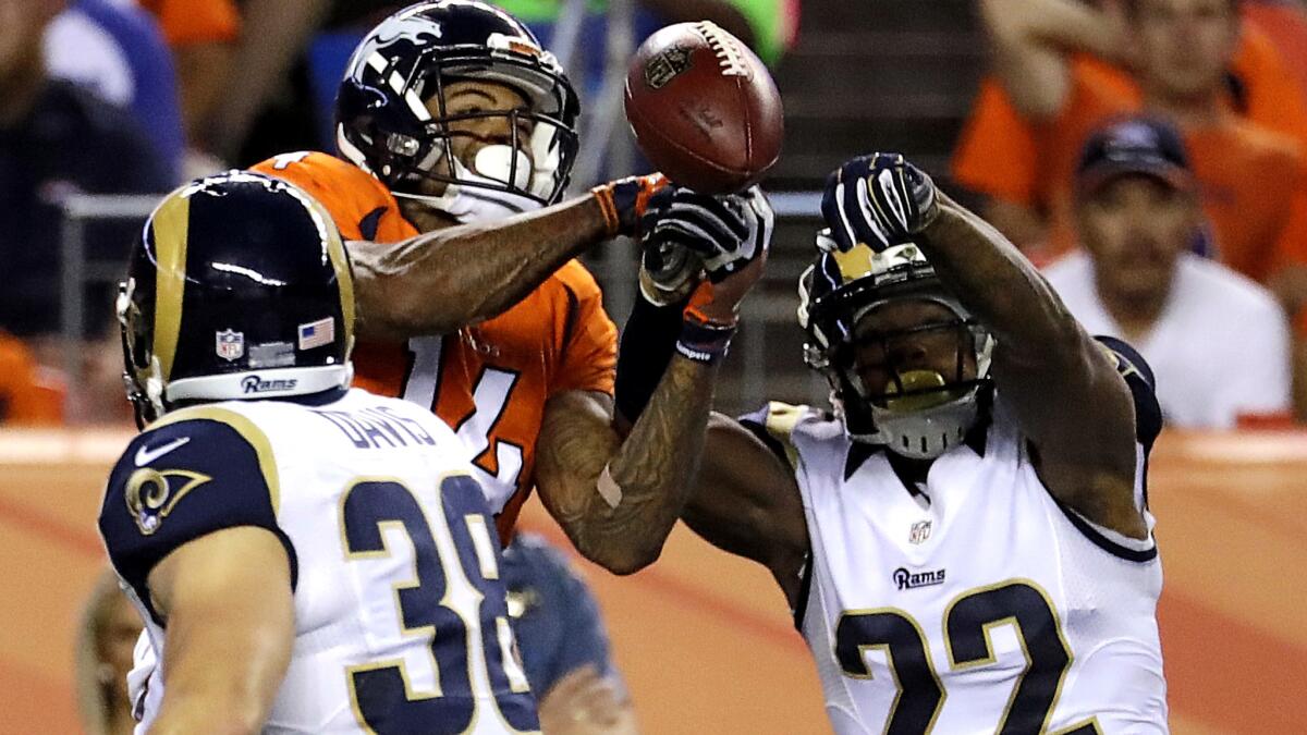 Rams cornerback Trumaine Johnson (22) breaks up a pass intended for Broncos receiver Cody Latimer on Saturday night.