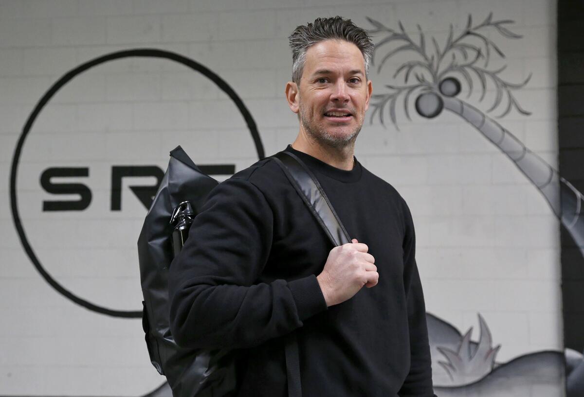 Newport Beach resident Paul Norris created the Surf Ready Fitness app and equipment bundle.