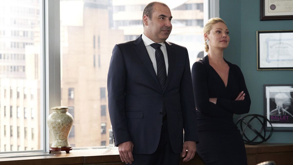 Rick Hoffman and Katherine Heigl in the series finale of "Suits" on USA.