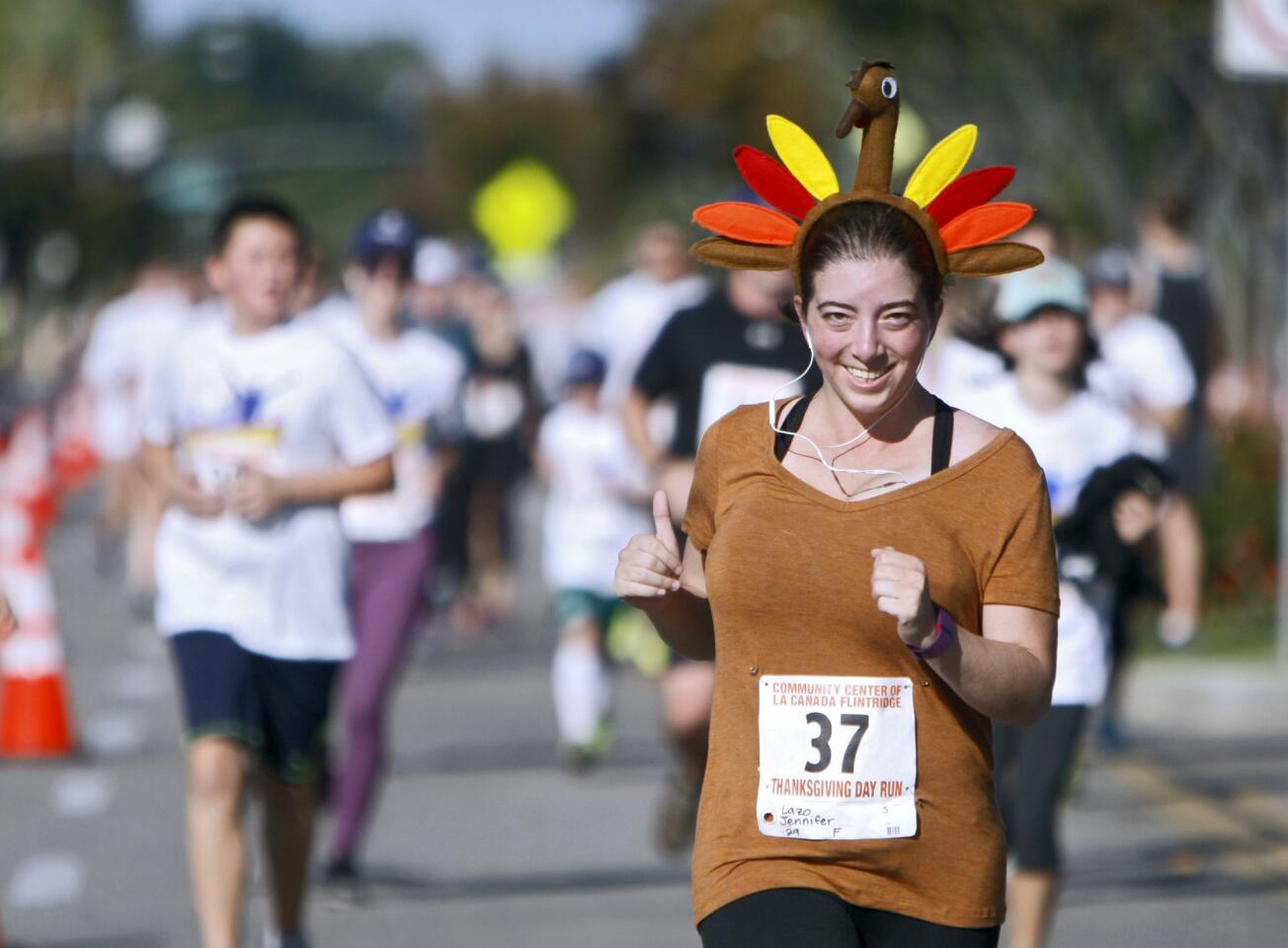 Jennifer Lazo, 29, participated in the annual Community Center of La Cañada Flintridge Thanksgiving Day Run, on Foothill Boulevard, in La Cañada Flintridge, on Thursday, Nov. 24, 2016. About 1,700 runners of all ages were expected to run.