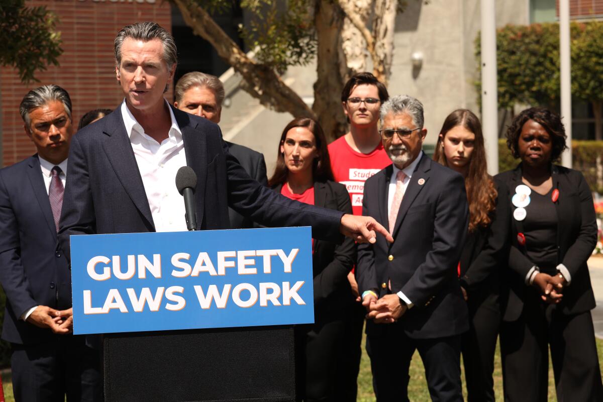 Gov. Gavin Newsom speaks about the prevalence of gun violence in society before signing Senate Bill 1327 in July 2022.