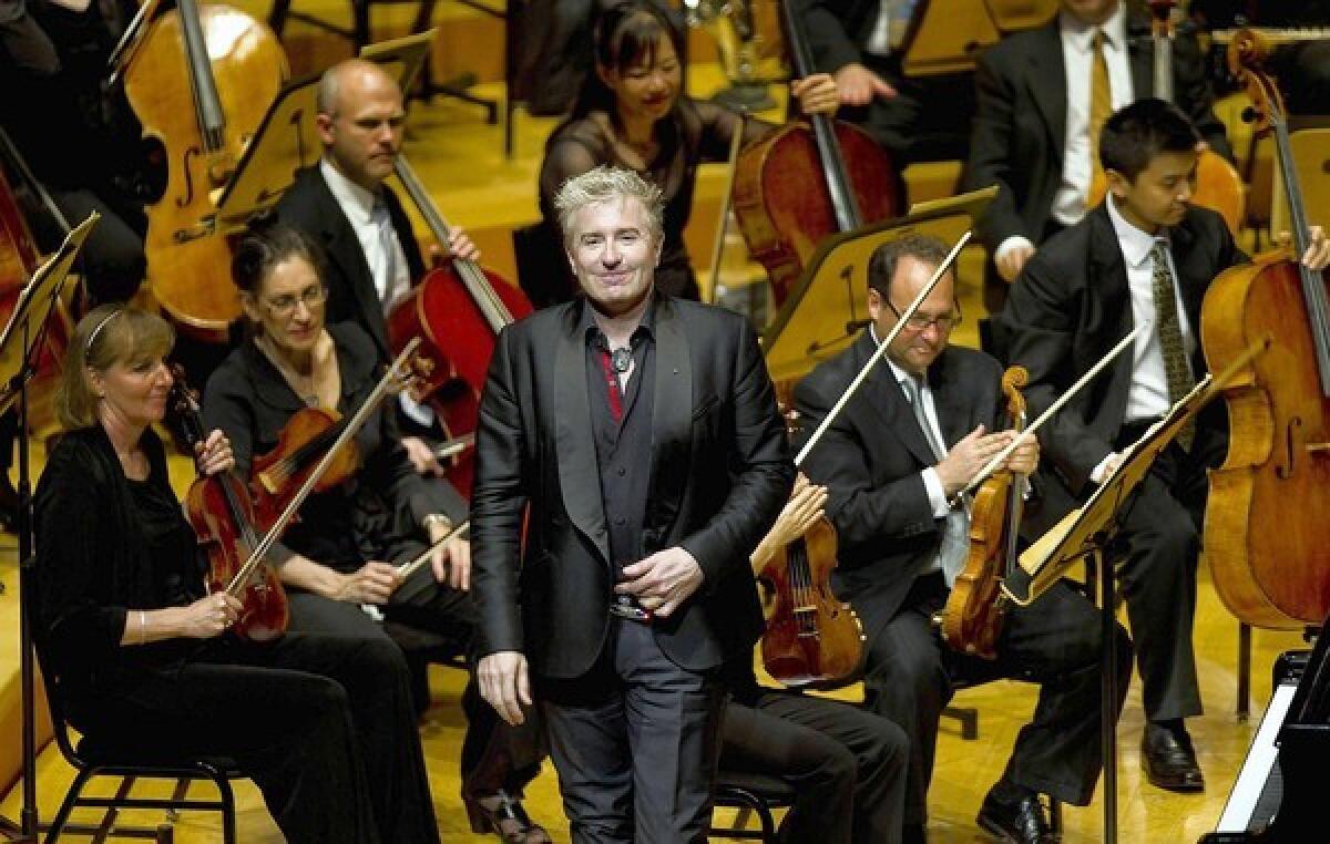 French piano soloist Jean-Yves Thibaudet takes his bow after playing with the L.A. Philharmonic.