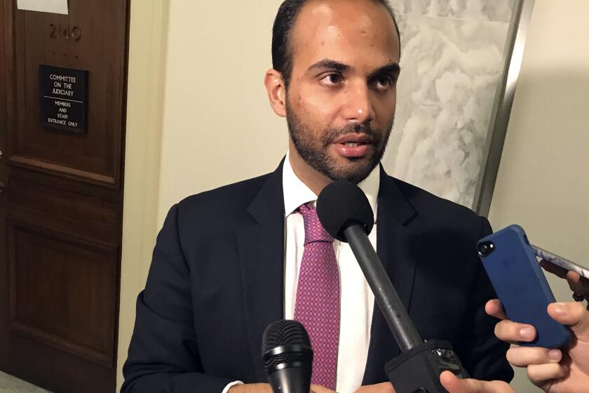 George Papadopoulos, the former Trump campaign adviser who triggered the Russia investigation, talks to reporters after his first appearance before congressional investigators, on Capitol Hill in Washington, Thursday, Oct. 25, 2018. (AP Photo/Mary Clare Jalonick)