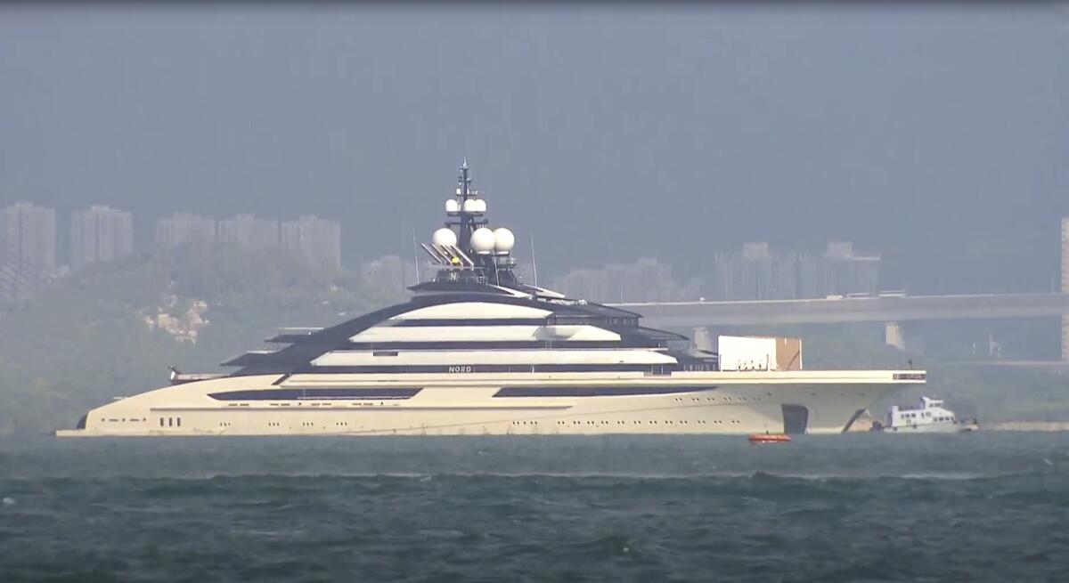 In this image taken from a video footage run by TVB, the megayacht Nord, worth over $500 million, is seen off Hong Kong Island outside Victoria Harbour on Friday, Oct. 7, 2022. The superyacht connected to Russian tycoon Alexey Mordashov has anchored in Hong Kong this week amid moves by Western governments to seize yachts connected to sanctioned Russian businessmen. (TVB via AP)