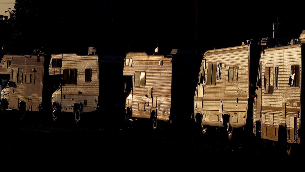 More than 9,100 vehicles are used as residences in L.A. County, according to the 2018 Greater Los Angeles Homeless Count. County officials hope to reduce that number while providing vehicle dwellers with more services. Above, a line of RVs parked in South Los Angeles.