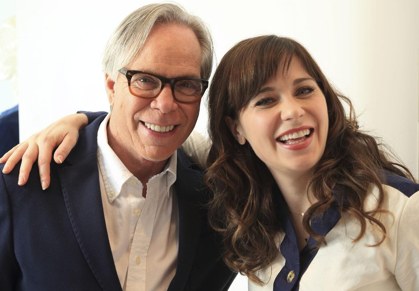 To Tommy, From Zooey, a capsule collection of dresses and accessories designed by actress-singer Zooey Deschanel, is available in Macy's and Tommy Hilfiger stores. Here, Deschanel pals with Hilfiger.