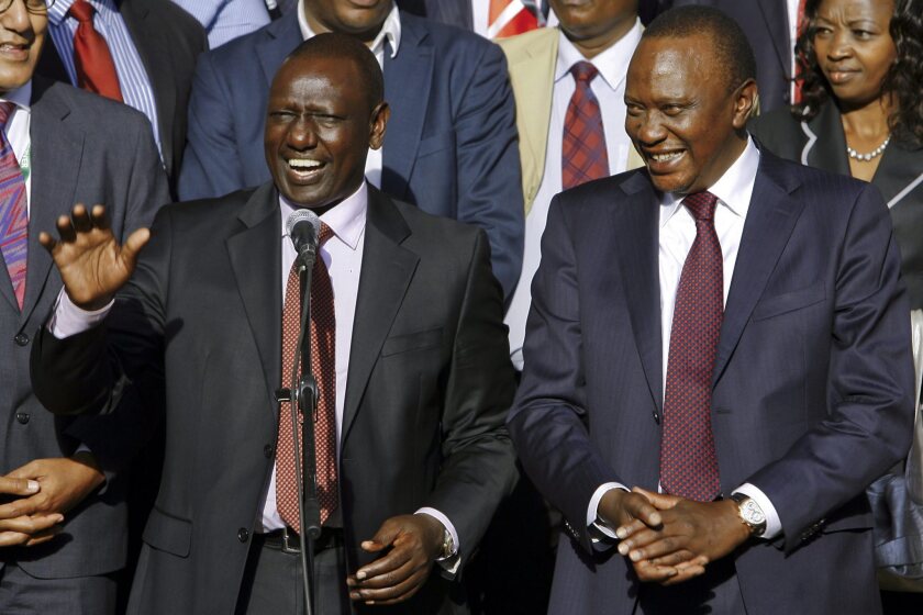 President Uhuru Kenyatta, right, and Deputy President William Ruto, left, are charged with crimes against humanity in connection with their alleged role in massacres after the 2007 Kenyan elections. Both have said they are not guilty.